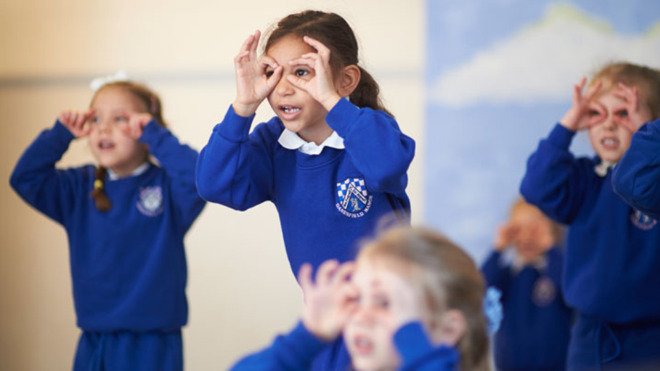 Teacher with young student in Brunei
