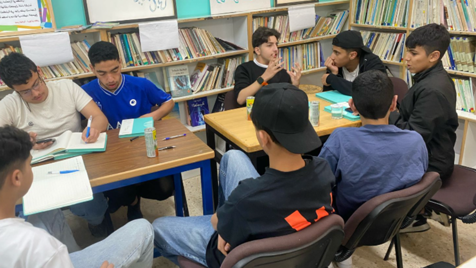 Middle Eastern teenagers learning