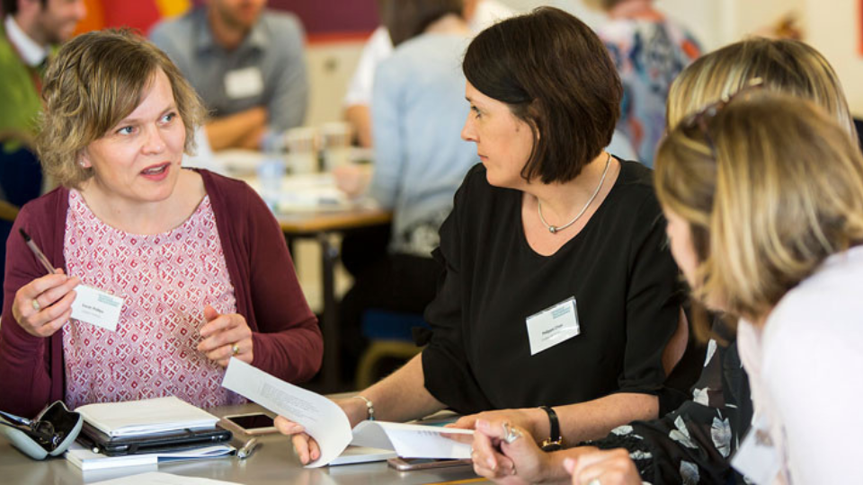 Early career teacher teaching secondary classroom